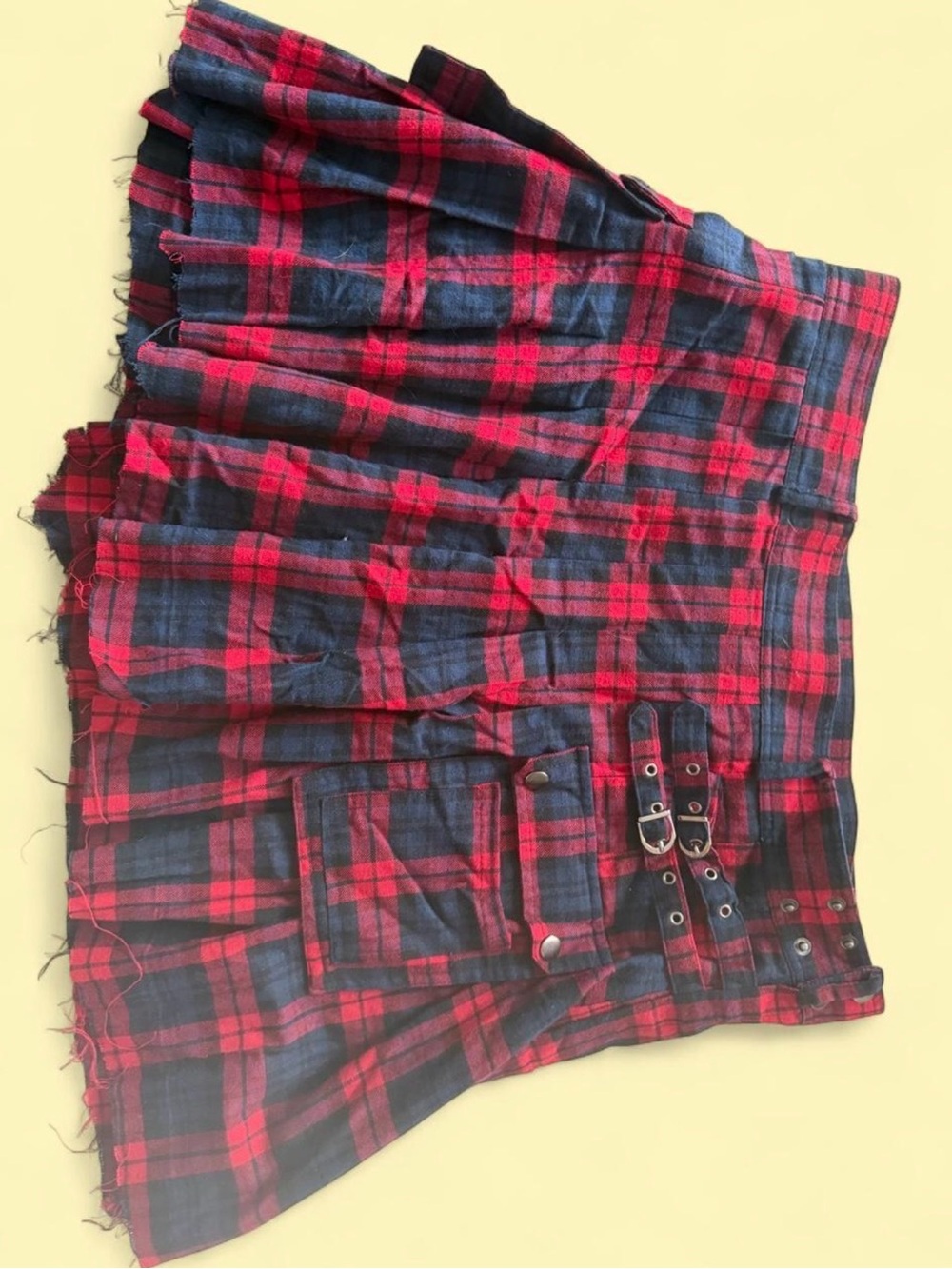 Red and Navy Plaid Pleated Mini Skirt with Buckle Detail